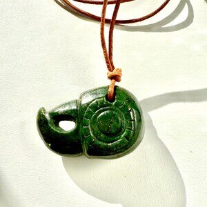 Guatemalan jade macaw pendant on leather cord